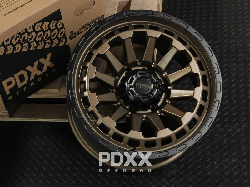 Load image into Gallery viewer, PDXX BEAST 17&quot; 6X139.7 Satin Bronze w/Black Ring Wheels+Tyres
