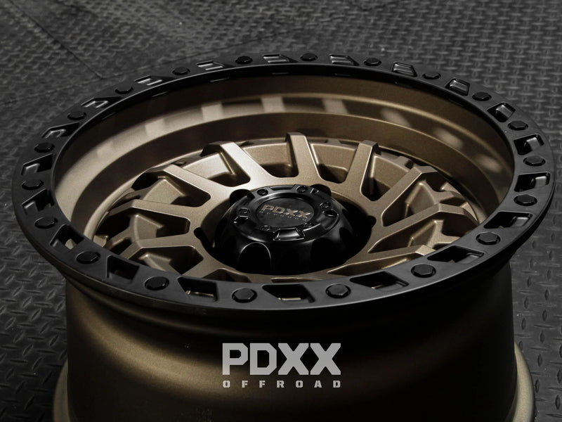 Load image into Gallery viewer, PDXX STIX 17&quot; 6X139.7 Satin Bronze w/Black Ring Wheels
