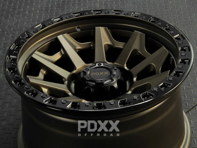 Load image into Gallery viewer, PDXX VIKING 17&quot; 6X139.7 Satin Bronze w/Black Ring Wheels
